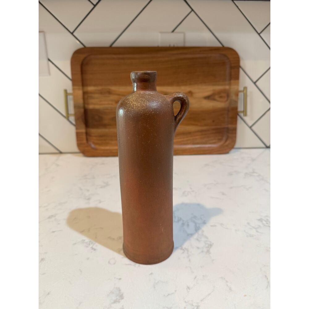 antique brown stoneware bottle 
Salt-glazed stoneware 19th early 20th centuries